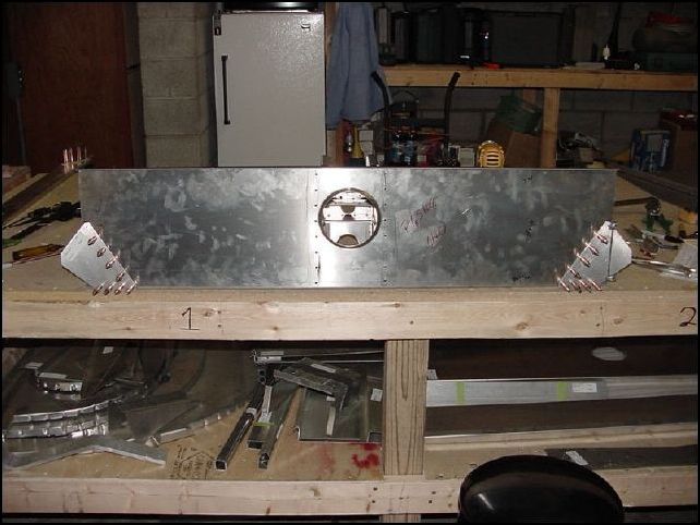 this image shows the front wing attach brackets clecoed to the front Z.