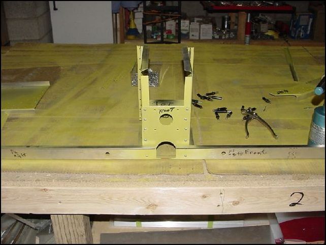 Rivet everything together.  Be sure that you do not rivet in an area where other parts go untill you have all of them in place.