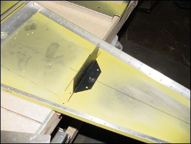 This image shows the stiffener in place with bolt down through hole.