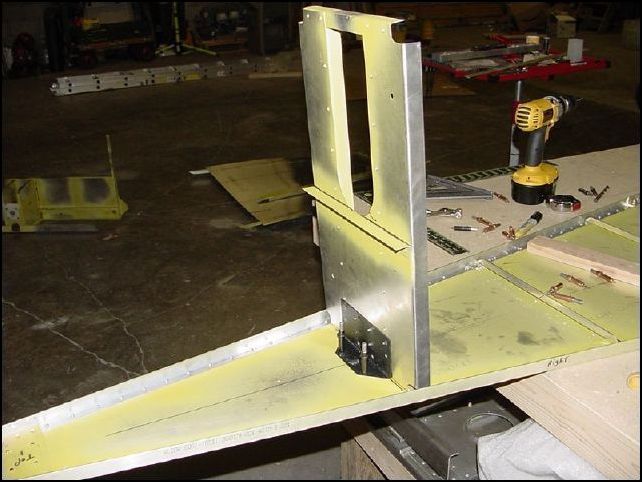 Cleco in place, then drill the stiffener to floor skin holes.