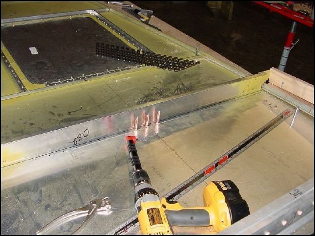 Drill adn cleco the spar to the table.  Drawing 640-F-21 shows A4 P40, the IPL did not say where to find this information.