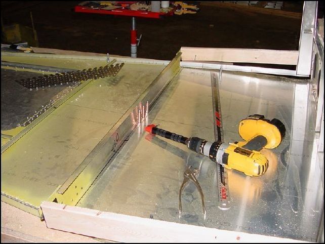 I only drilled a few rivet locations for now.  You may want to do the complete spar, but I want to make sure that everything lines up correctly before drilling all the holes.