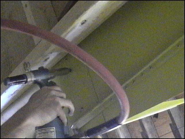 Position the cabin floor to the rear fuselage floor and cleco the center spar in place.  Then rivet the center spar in place with A5 rivets.  DO NOT RIVET IN THE LONGERON AREA.