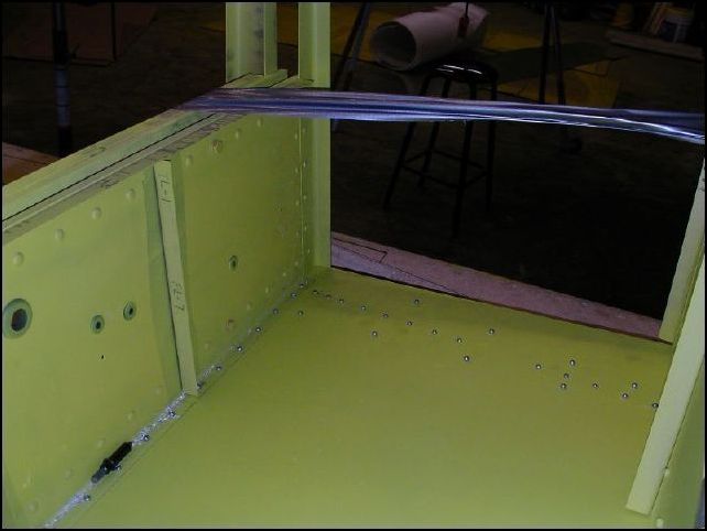 Image of rivets for longeron and doubler in front of the center spar.