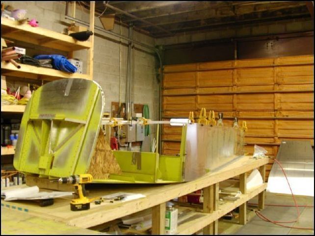 Another image showing the top longeron clamped in position.