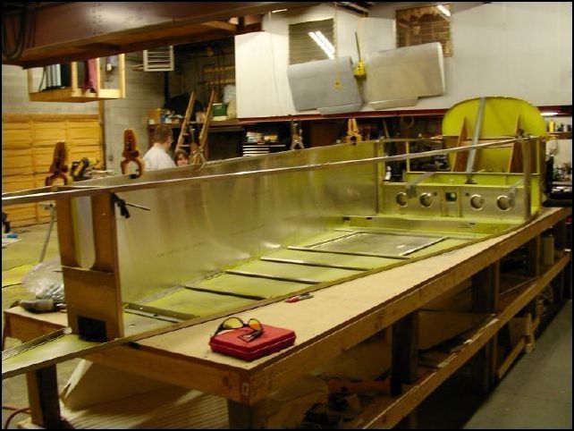 This image shows both longerons clamped to the fuselage, however you should install the other side skin before doing this.  I did this just to get the feel for the size of the aircraft.  I know, wasted time, but it was fun <grin>.