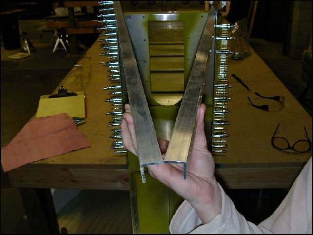 Make SURE that your longerons are lined up before you drill any rivet holes through the skin into the top longerons.  Then drill holes about every 300 mm in the top.  These holes will be flush riveted so that the top skin can lay flat over them.