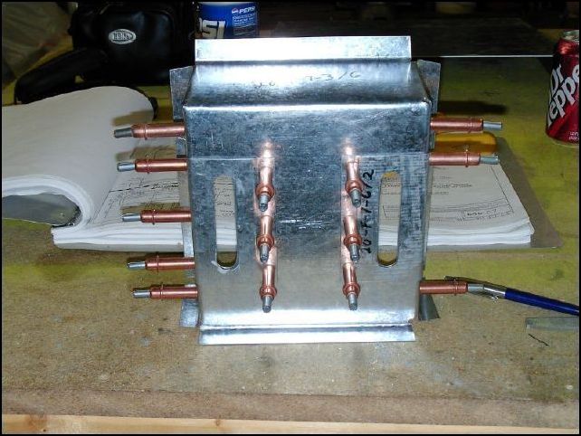 Position 20-F-7-6 to 20-F-7-3.  Drill and cleco in place AS 4 P40.  Be sure that you leave a small gap between the face of 20-F-7-3 and the back of 20-F-7-6 so that 20-F-7-5 can slide freely between them.