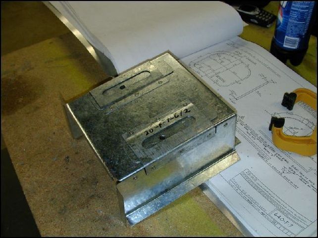 Slide 20-F-7-5 between 20-F-7-6 and  20-F-7-3.  Now rivet the sides.  Again, be sure to use SS rivets.