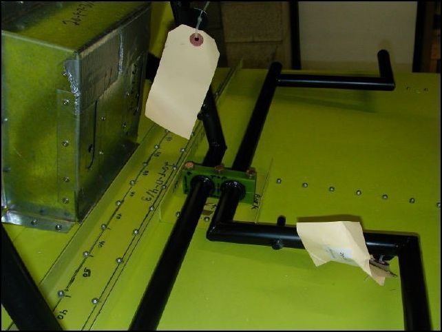 Place the rudder pedals in the center bearing and bolt the bearing to the floor.