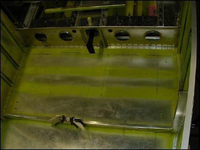 remove the gear floor siffeners and rear seat front support.  Deburr, clean, and prime.