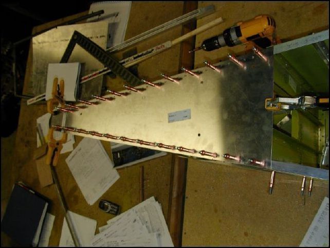 Drill and cleco the upper skin in place.  This image shows A4 clecos but I will drill all holes to A5 before riveting.