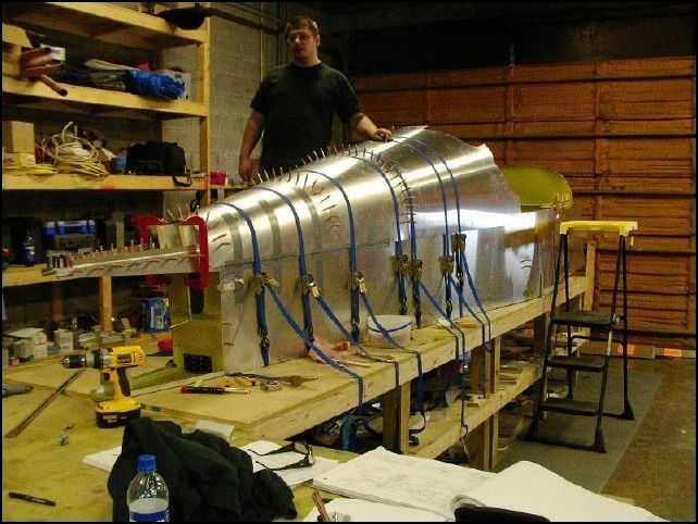 For this step I needed a helper so Rob gave me a hand by putting in the clecoes as I drilled the bulkheads from inside the fuselage.  From inside the fuselage I measured each bulkhead to position them to the top longerons and also checked to make sure each bulkhead was at 9 degrees.