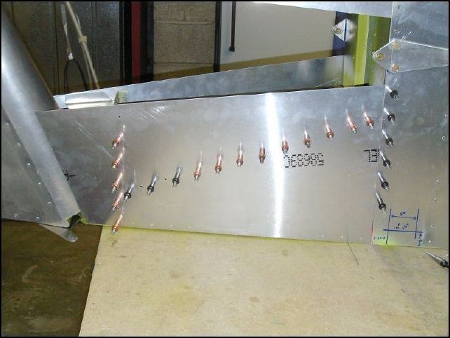 Position second lower skin to fuselage, drill and cleco in place.