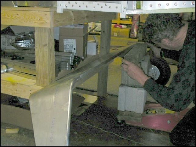 We decided not to flip the fuselage upside down.  Instead we used a jack and lifted the landing gear to the fuselage.