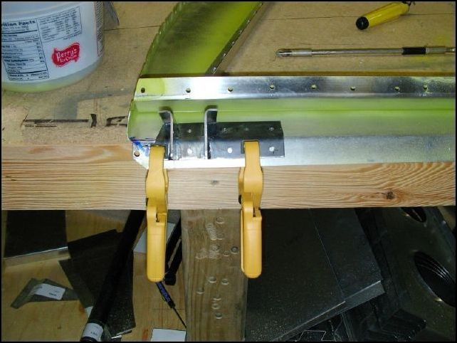 Clamp the flap motor bracket to bulkhead 3.  Drill and cleco A5.