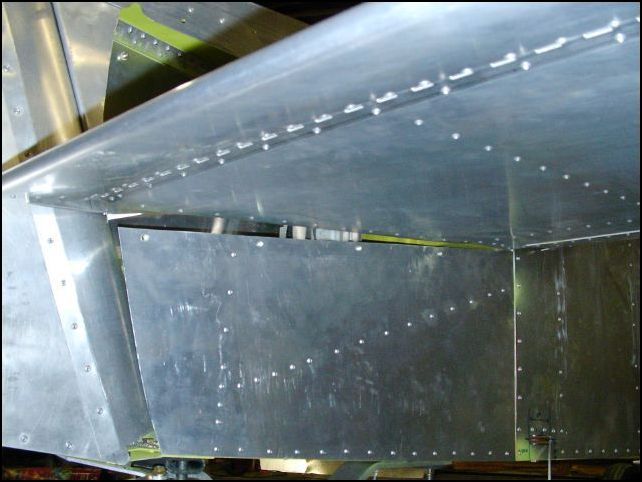 Install rivnuts in the lower side of the fuselage tail.