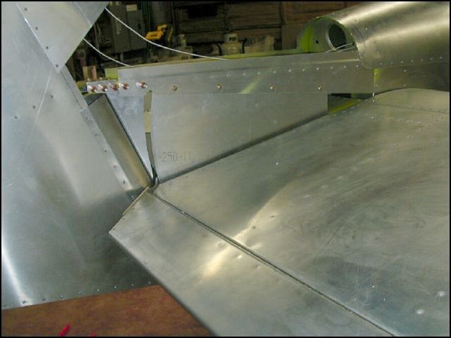 Screw tail side covers in place.