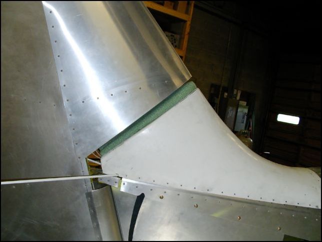 Cut molding foam to shape and size required to fill the gap between the saddle and the rudder.