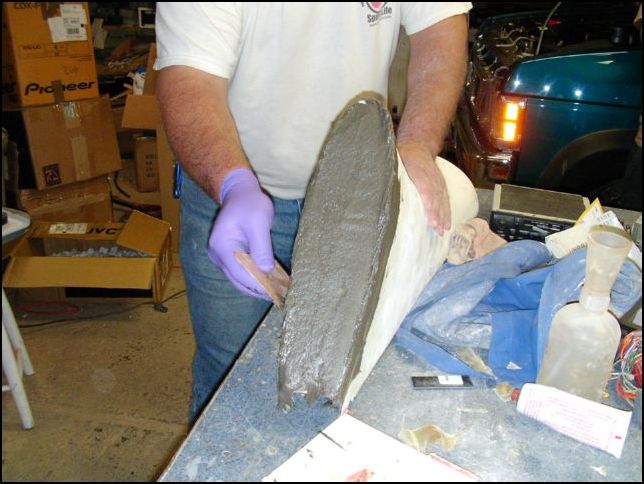 apply fiberglass filler over the fiberglass sheets