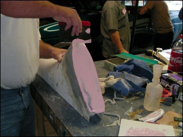 apply second layer of fine filler, sand and repeat until smooth.