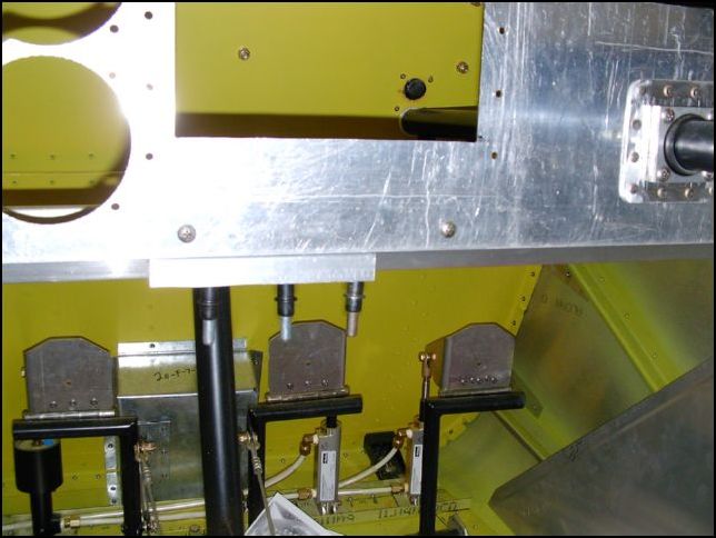 Drill and cleco angle to the center bottom of the instrument panel for the center panel.