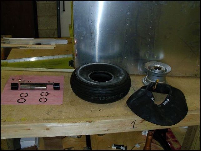 Assemble the nose wheel.  You will need the axel, axel bolt, spacers, arbor shims, washers, and nut.