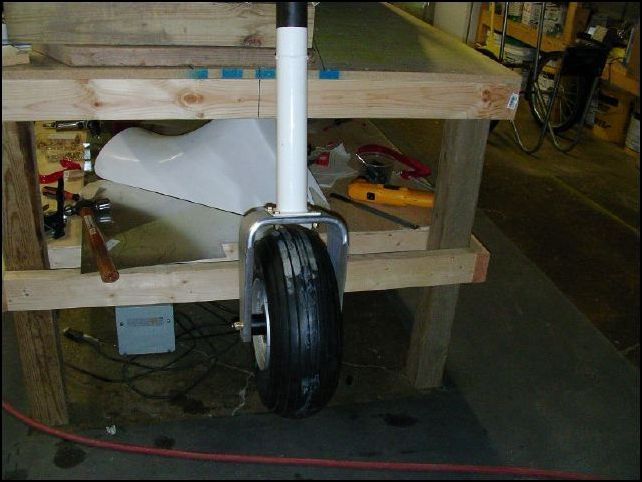 Install nose wheel to nose wheel fork.