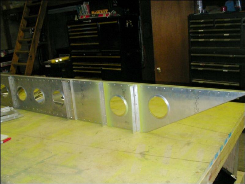 Bolt the wing tip extension to the wing spar.