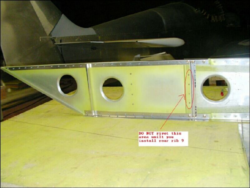 Rivet spar caps and angles to the wing tip extension.  NOTE:  DO NOT RIVET in the rear rib 9 area.