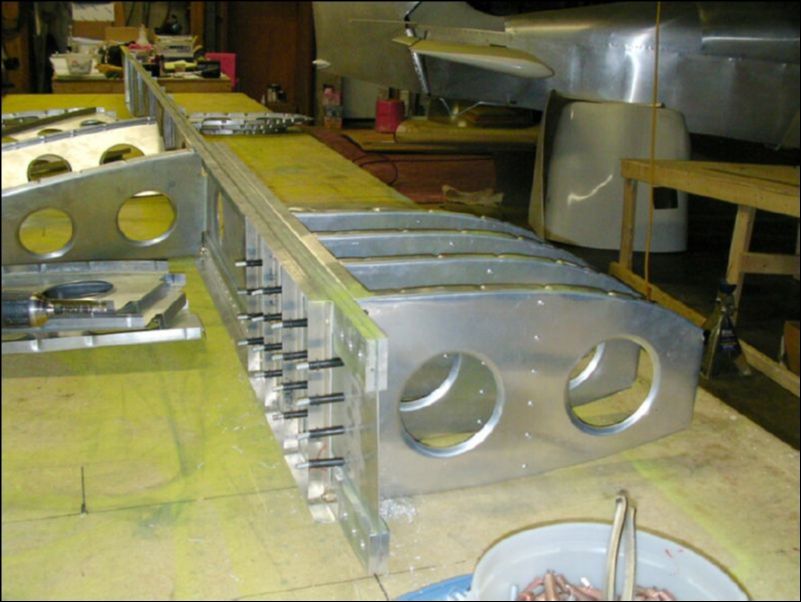 Drill and cleco nose rib 1 - 9 to the wing spar.