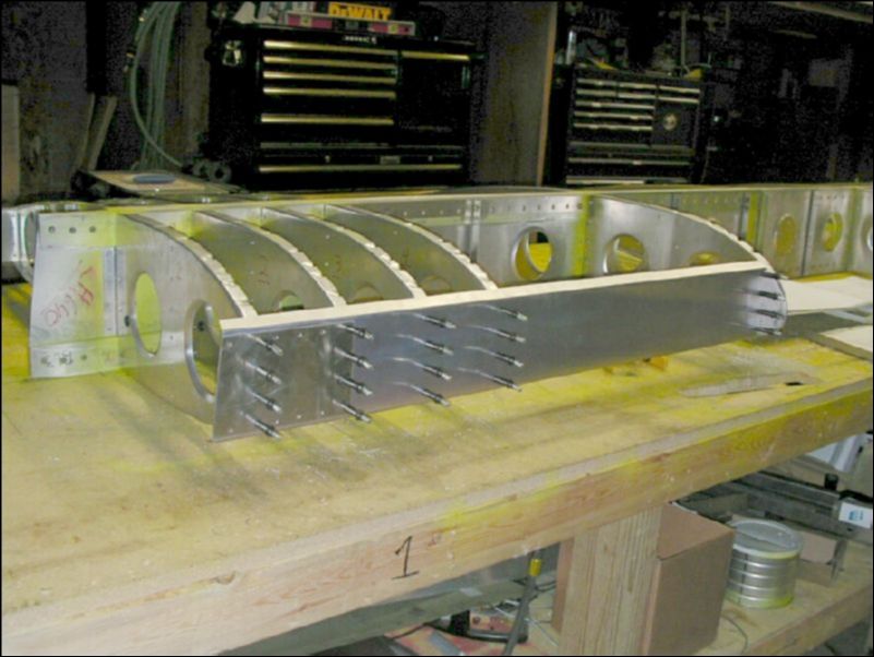 Drill and cleco front channel to front ribs