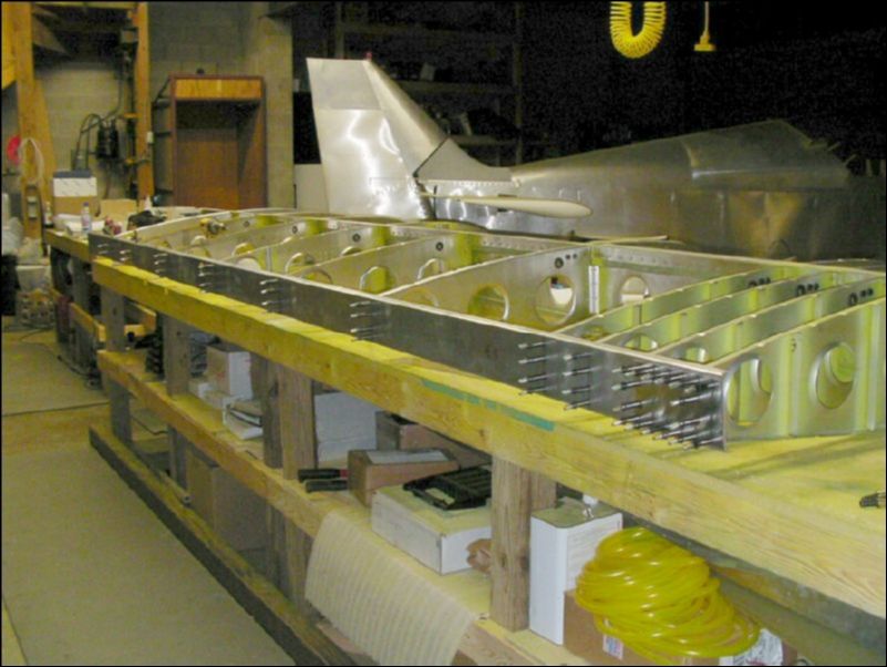 Drill and cleco rear channel to rear ribs