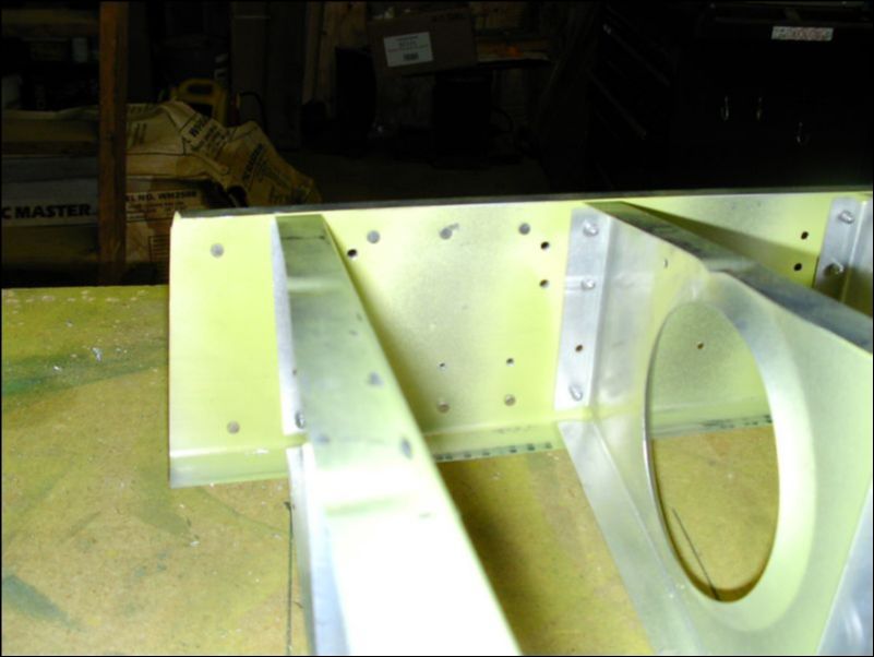 This is the inside of the rear wing pickup with solid rivets installed