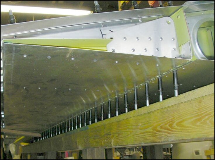 Drill and cleco the flap hinge to the rear channel.