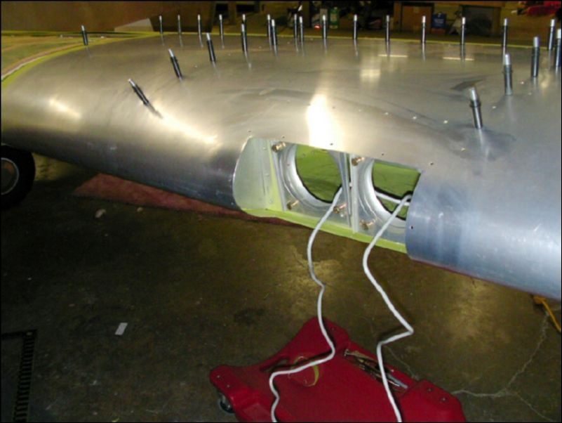 cut hole in left wing for landing and taxi lights.