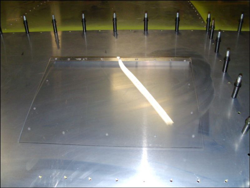 Fit landing and taxi light lense and install the stiffener to the top of the lense.