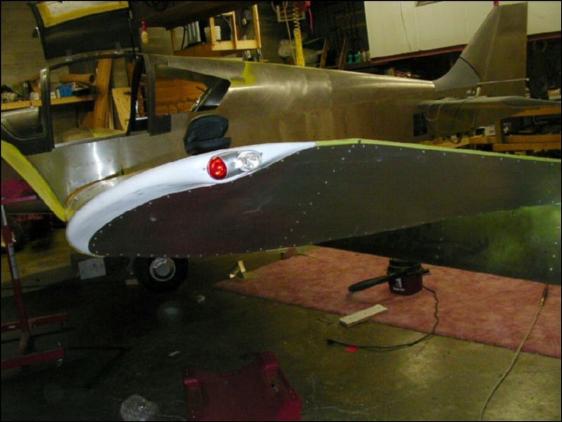 Rivet the bottom wing tip skin.