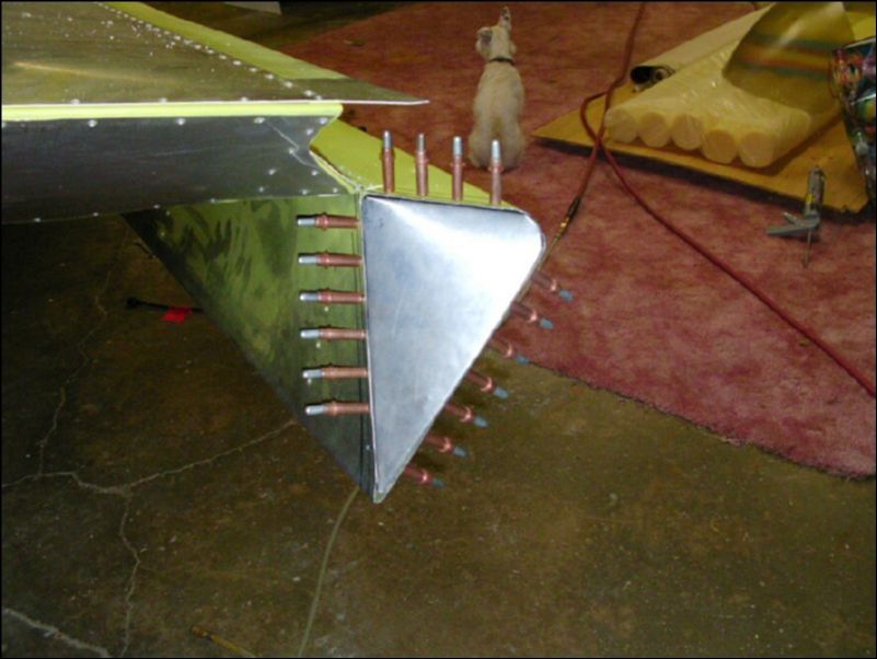 Form an aileron tip insert then drill and cleco it to the aileron.