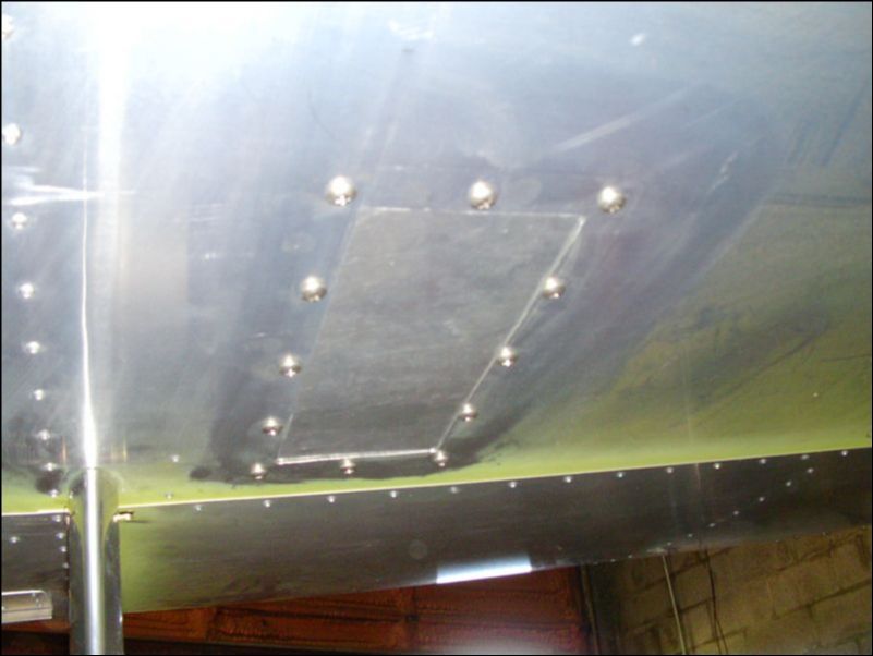 Install access hole cover on bottom of both wings.