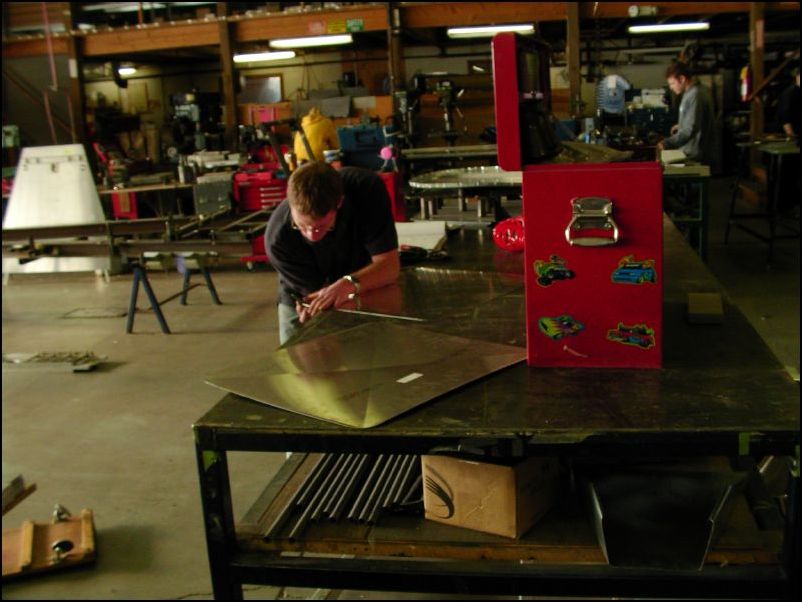 working on the fuselage access door