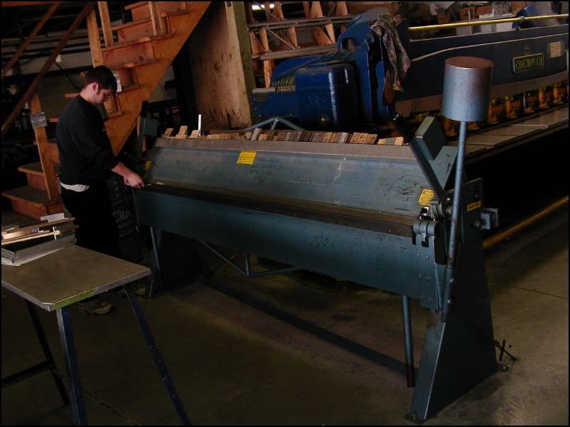 Now THIS is a bending brake.  I WANT ONE!