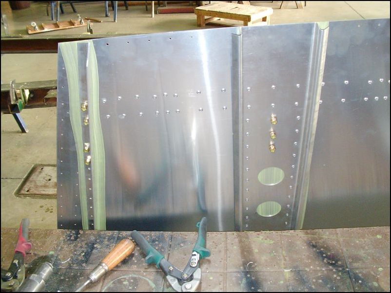 Cabin floor with brake cylinder brackets and bearings installed