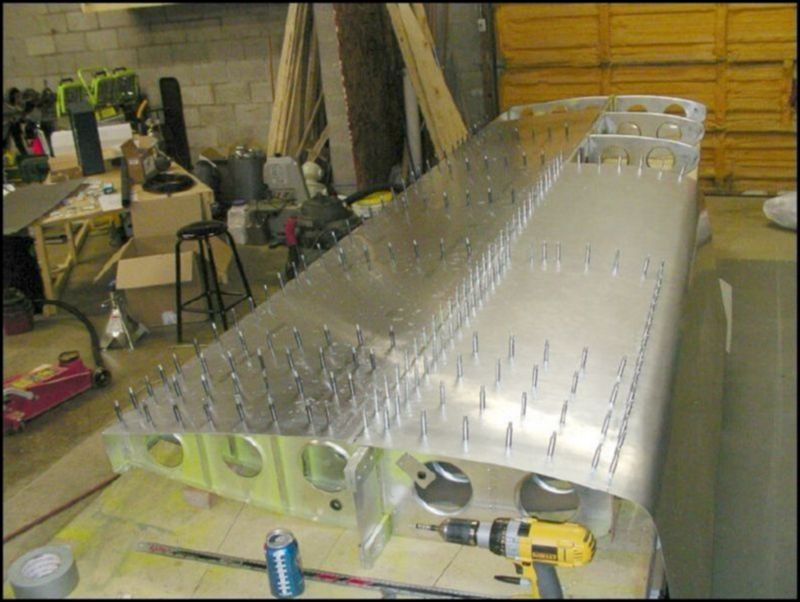 Drill and cleco the bottom of the IB front skin.  Pay close attention to the rivet pitch for this area.  It is P30 from rib 1 to rib 4 and then P32 from rib 4 to rib 6.