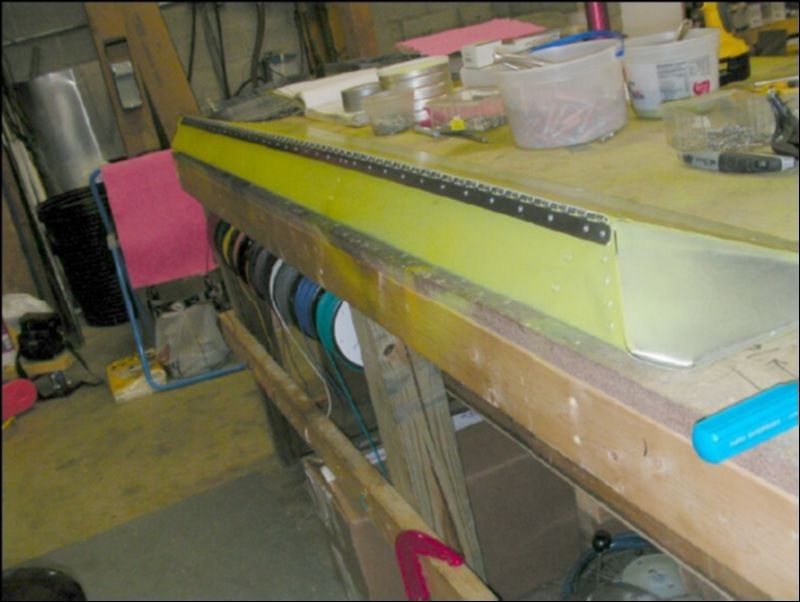 Rivet hinge to aileron.