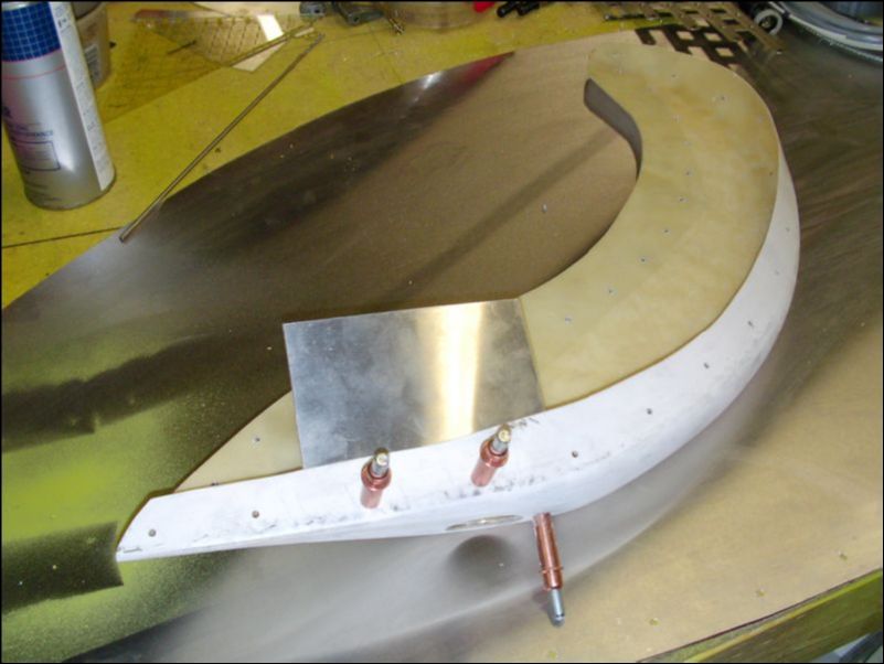 Remove fiberglass wing tip and install the strobe light bracket.