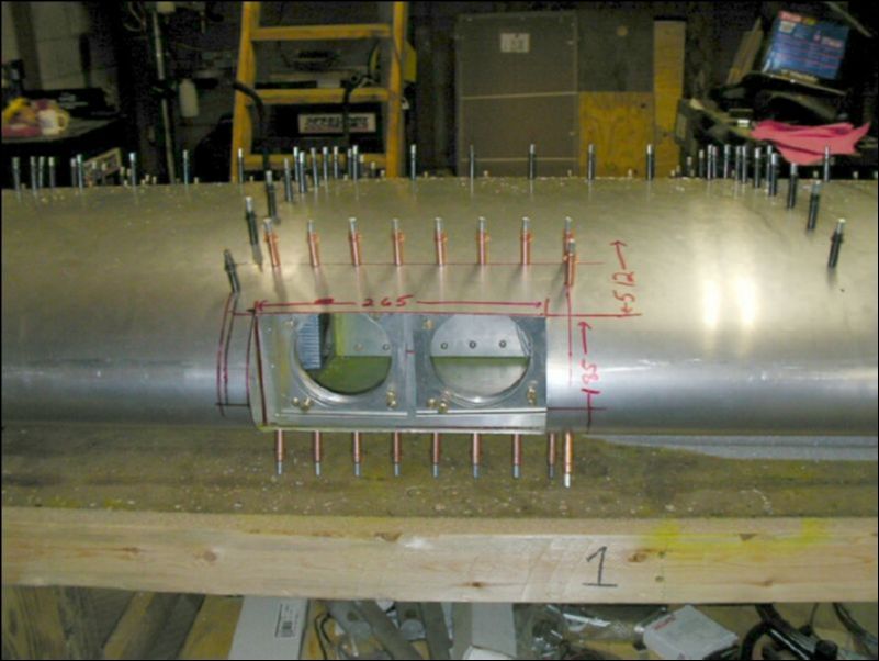 Position, drill, and cleco landing / taxi light assembly to wing.