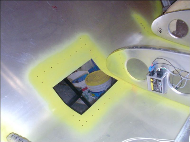 Deburr, clean, and prime wing area for landing / taxi light assembly