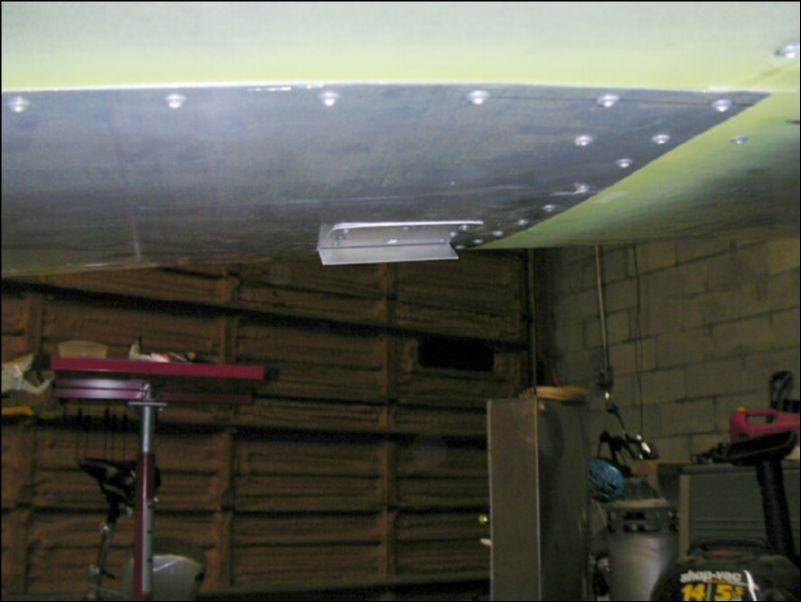 Install tank vent deflector.  I added a plate to the bottom of the wing skin to cover the hole I had made for the fuel tank vent.  This worked out very nicely.