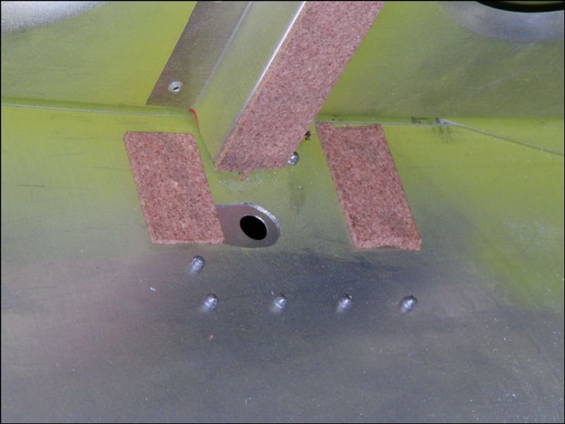 I installed cork over the rivets in the bottom wing skin to make sure they don't ever hit the fuel tank.
